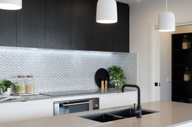 Southport 217 kitchen with geometric patterned splashback