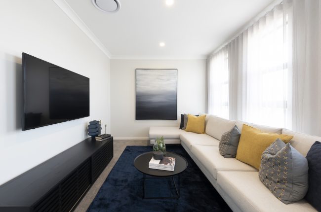 Monaco 1 211 theatre room with flat screen tv mounted on wall