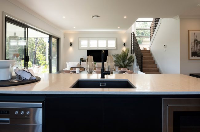 Byron 250 view of open plan kitchen, living and dining room from kitchen