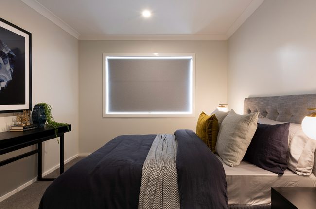 Monaco 1 211 bedroom with wall art and artificial plants