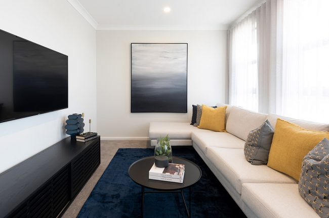 Monaco 1 211 threatre room with multicoloured couch pillows