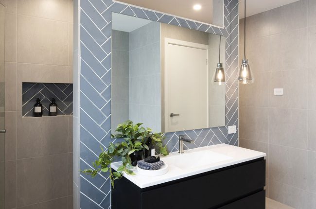 Geometric themed bathroom design in the San Tropez display home