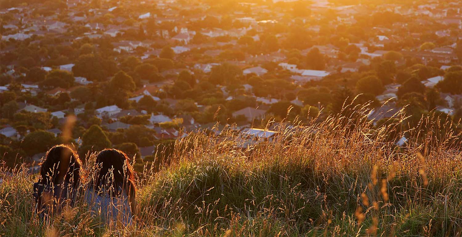 couple looking over cameron grove estate