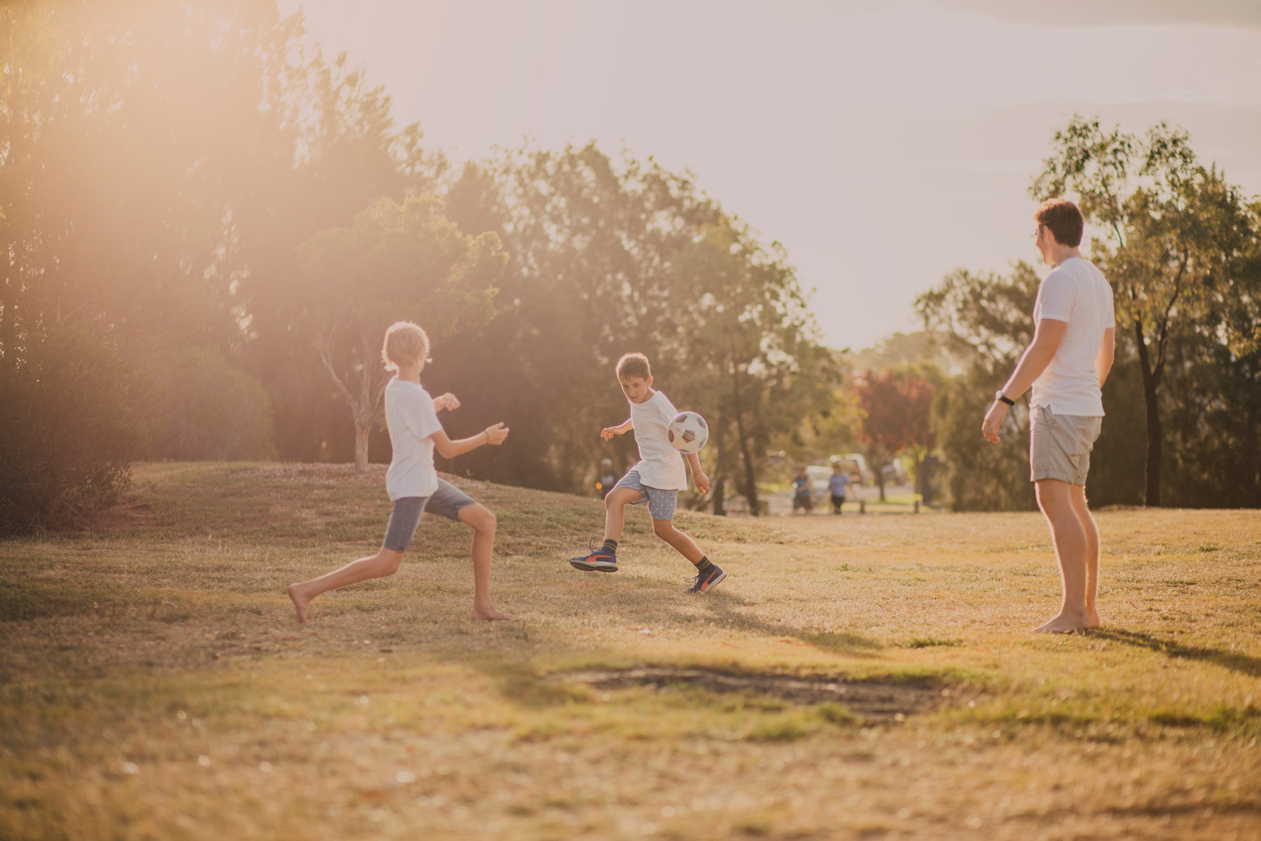 family playing soccer at carmel hill