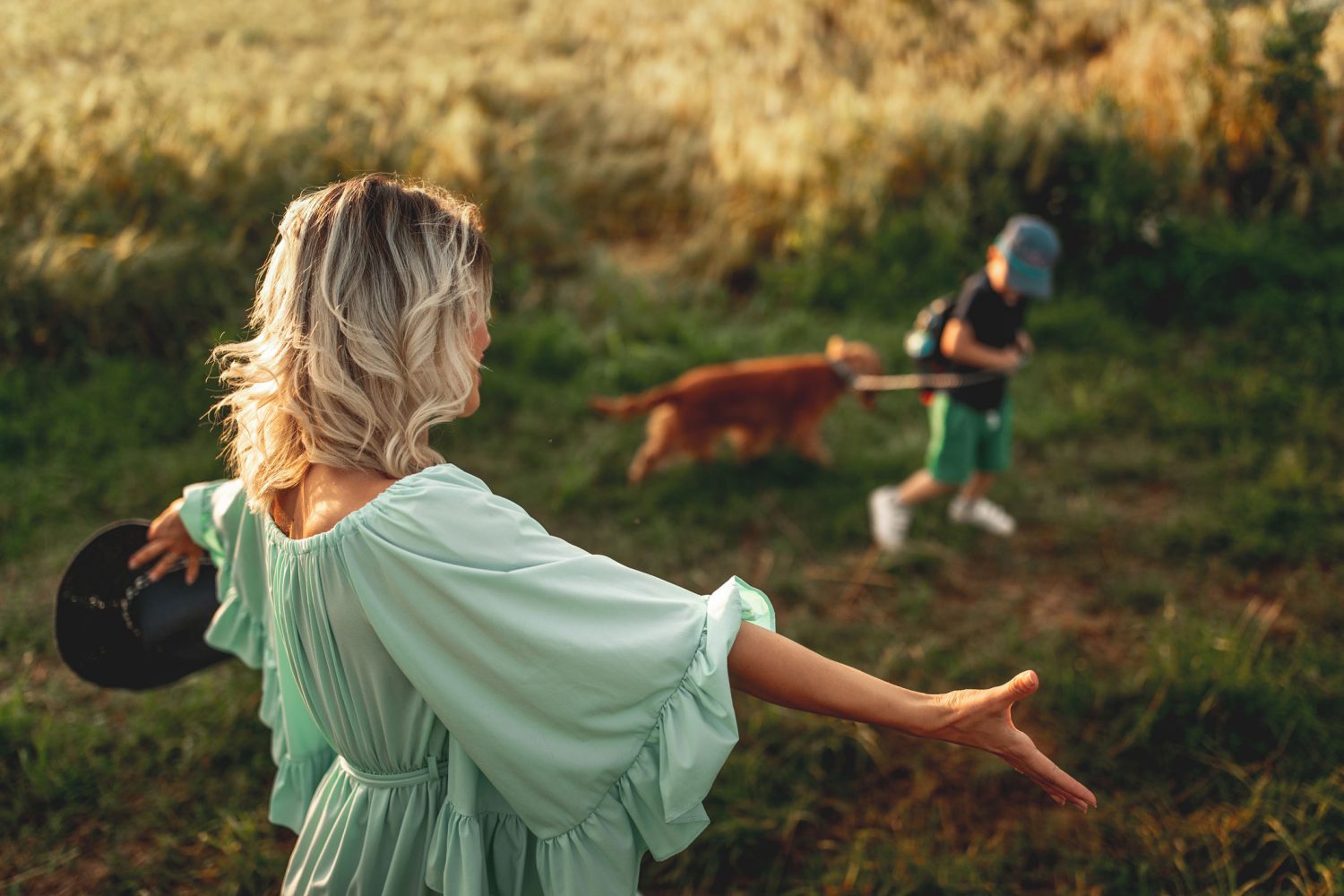mum and child walking dog in oxley ridge