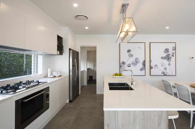 Avalon 2 220 kitchen with white stone countertops