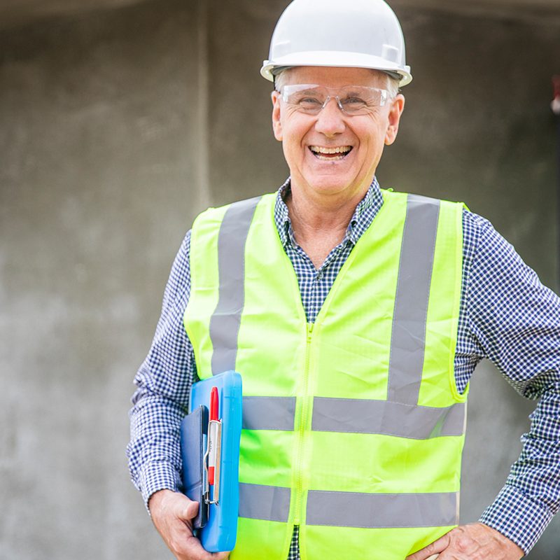 why-service inspector in high vis with clipboard