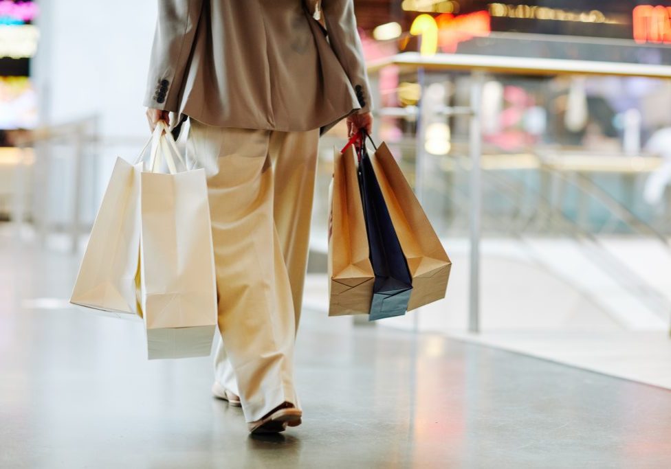 Girl with Shopping Bags in Mall Minimal Girl with Shopping Bags in Mall Minimal